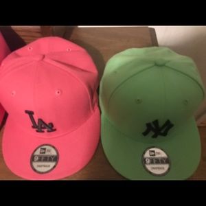 Two baseball hats